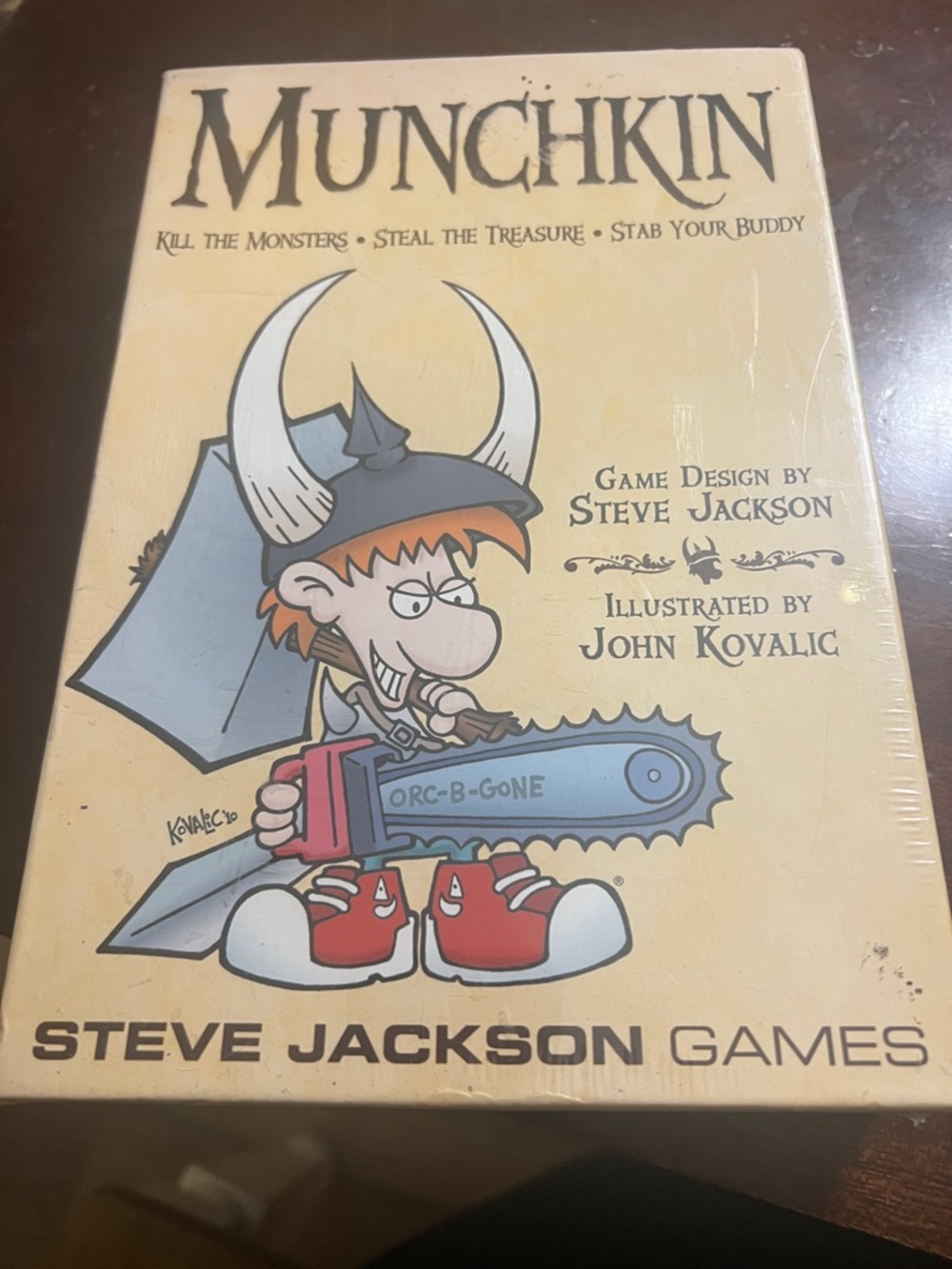 New sealed Munchkin Board Game.  Some wear to packaging.
